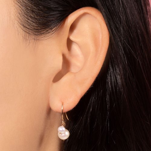 BUDDY PEARL HOOK EARRINGS ON BODY