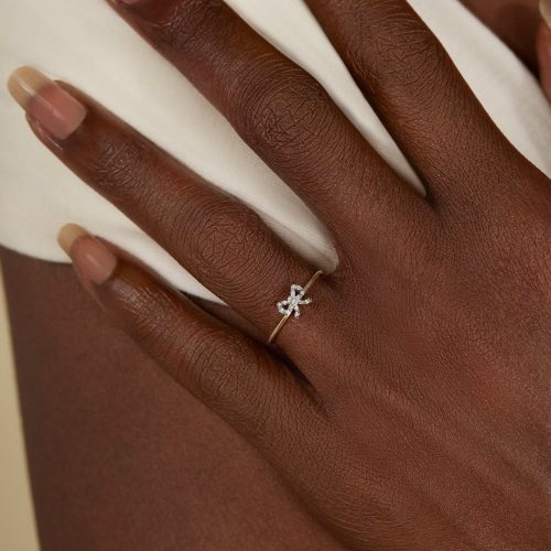 DAINTY DIAMOND BOW RING ON BODY