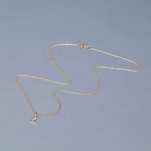 DIAMOND CURSIVE INITIAL NECKLACE EDITORIAL