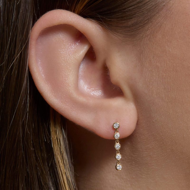 DIAMOND RALLY TENNIS EARRINGS ON BODY