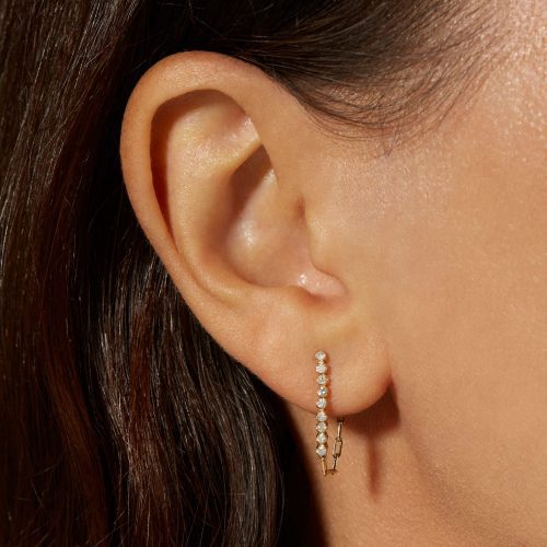 DROP SHOT FRONT TO BACK DIAMOND EARRING ON BODY