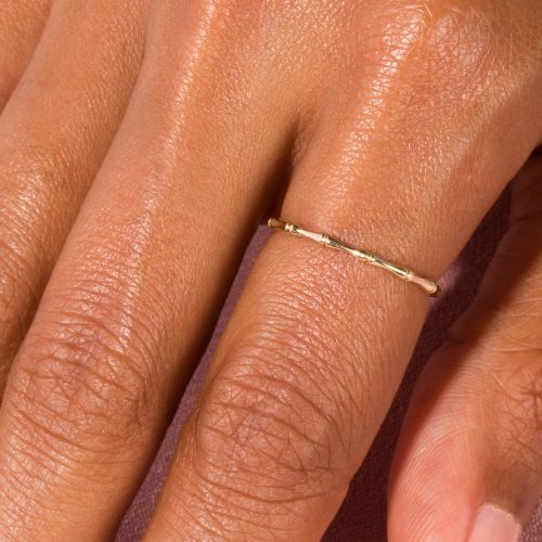 GOLD BAMBOO RING ON BODY