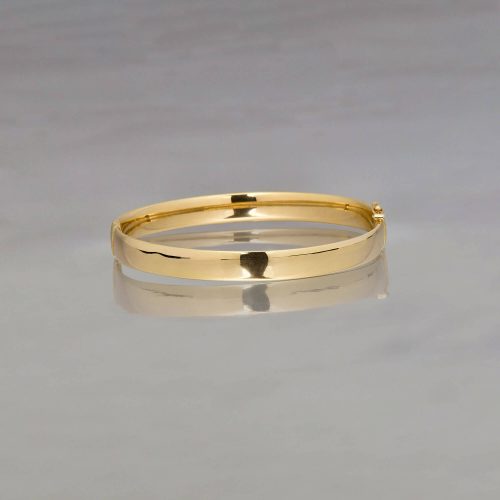 GOLD CIGAR BANGLE EDITORIAL a0a8a6f7 094f 419c 9250 7e11a9f7b75c