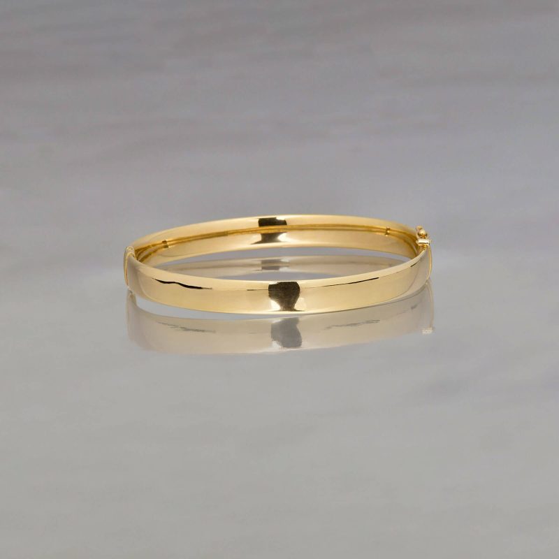 GOLD CIGAR BANGLE EDITORIAL a0a8a6f7 094f 419c 9250 7e11a9f7b75c