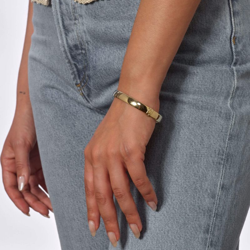 GOLD CIGAR BANGLE ON BODY