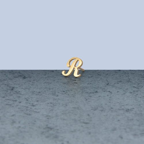 GOLD CURSIVE INITIAL STUD EDITORIAL R