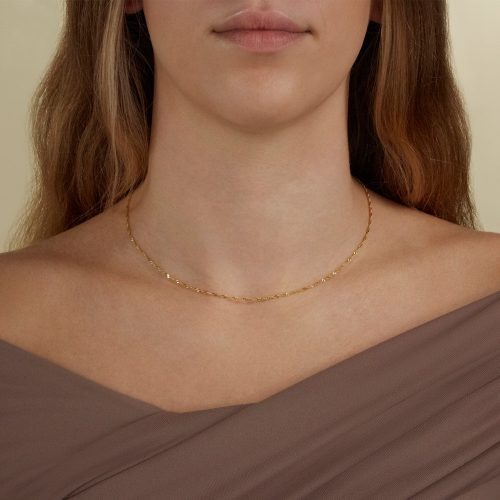 GOLD GLIMMER CHAIN ON BODY