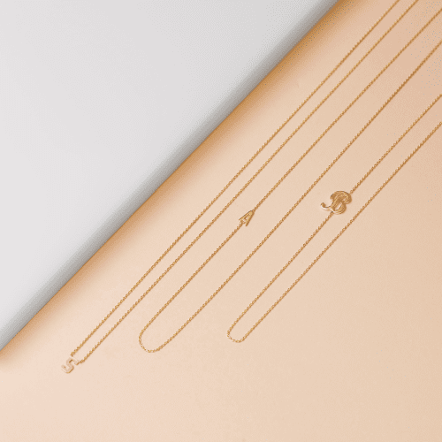 GOLD INITIAL NECKLACE EDITORIAL COLLECTION 2