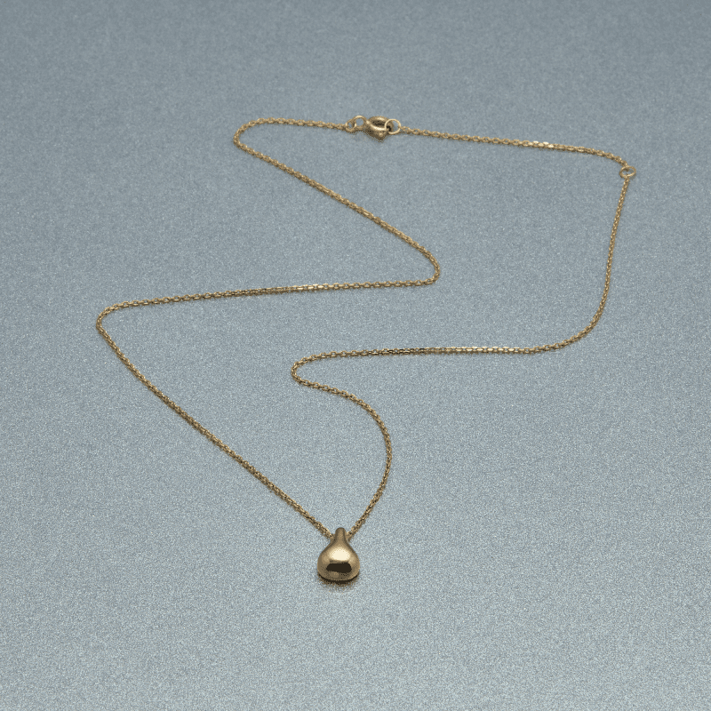 Gold Drop Necklace Still Life