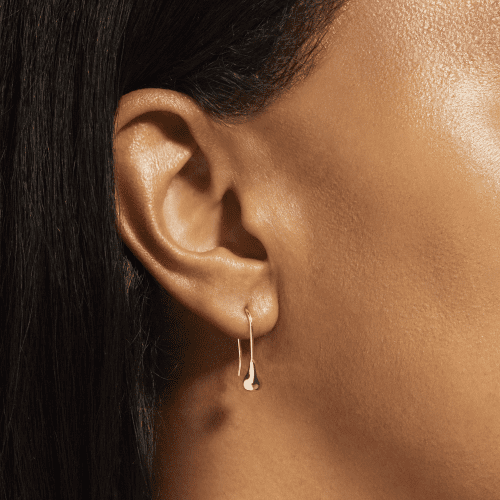 Golden Droplet Earrings On Body