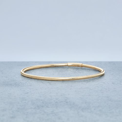 LIQUID GOLD STRETCH BRACELET EDITORIAL