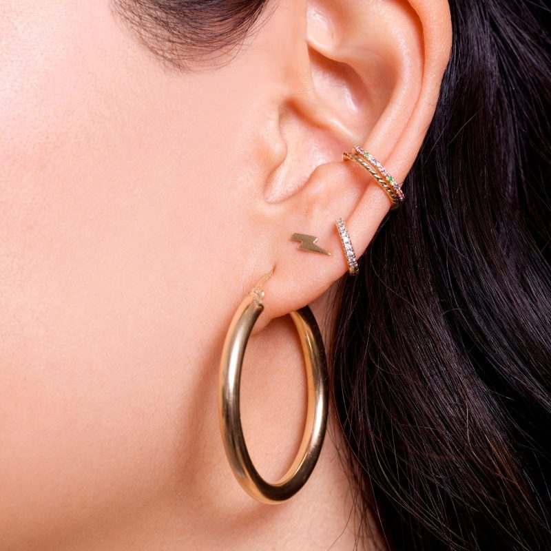 MEDIUM HOLLOW HOOP EARRINGS ON BODY 1