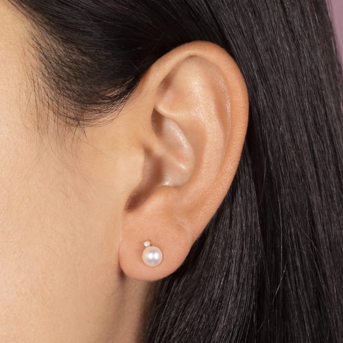 MEDIUM PEARL AND DIAMOND STUD EARRINGS ON BODY