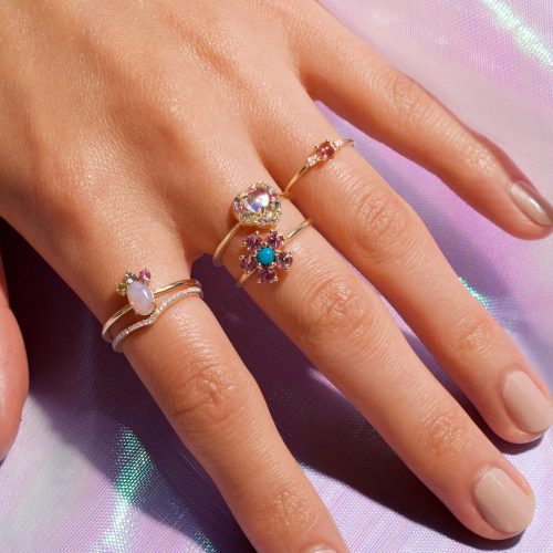 OVAL OPAL UNICORN CROWN RING ON BODY