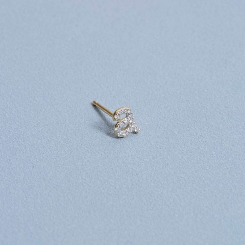 PAVE DIAMOND INITIAL STUD EDITORIAL