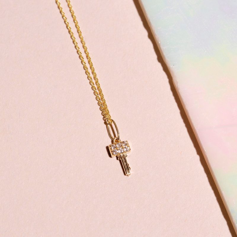 PAVE TOPAZ KEY PENDANT EDITORIAL