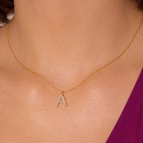 PEARLY INITIAL NECKLACE ON BODY 1