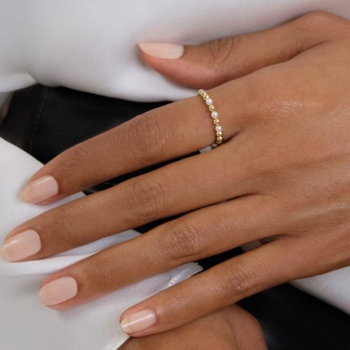 POLISHED IN PEARLS RING ON BODY