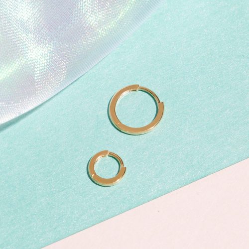 SECOND HOLE TEENY GOLD HUGGIE CLICKER EARRING EDITORIAL COLLECTION