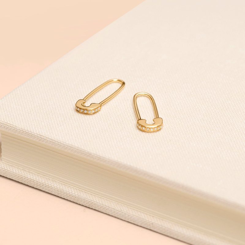 SPARKLE SAFETY PIN EARRING EDITORIAL