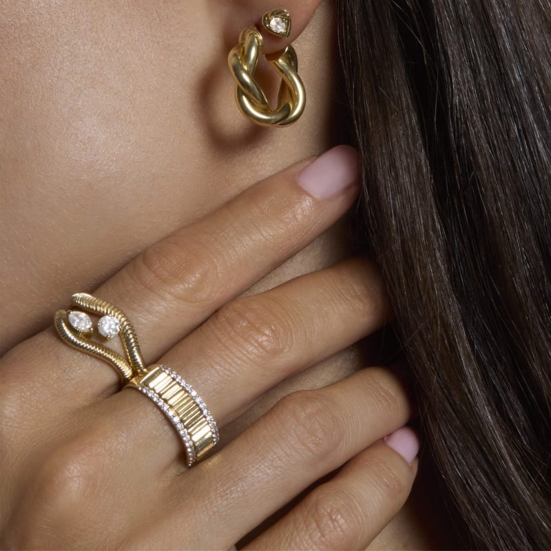 STONE AND STRAND RINGS AND EARRINGS ON MODEL