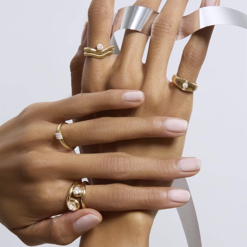 STONE AND STRAND RINGS ON MODELS HANDS 890224f7 e88f 4ac4 a350 2fea10059632