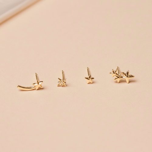 TEENY DIAMOND GOLD NORTH STAR STUD EDITORIAL COLLECTION 2