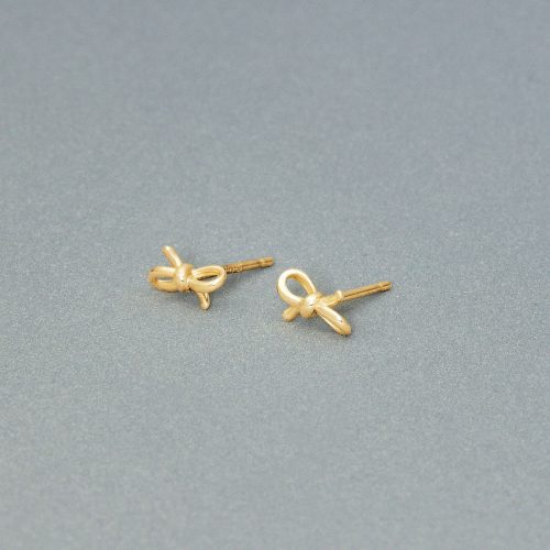 TEENY GOLD BOW STUDS EDITORIAL