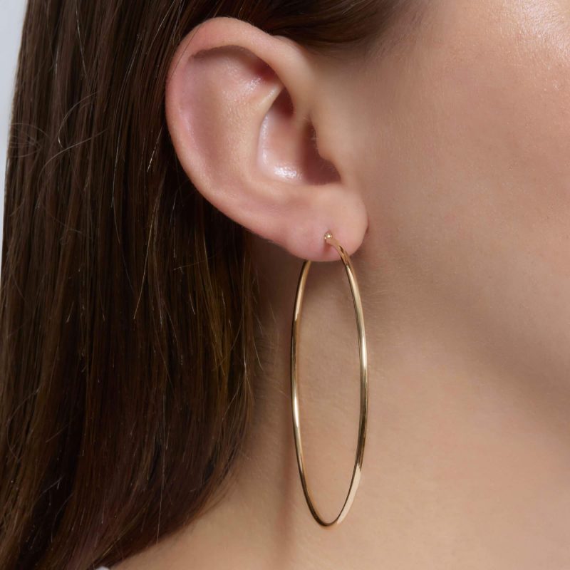 THIN GOLD HOOPS 65MM ON BODY