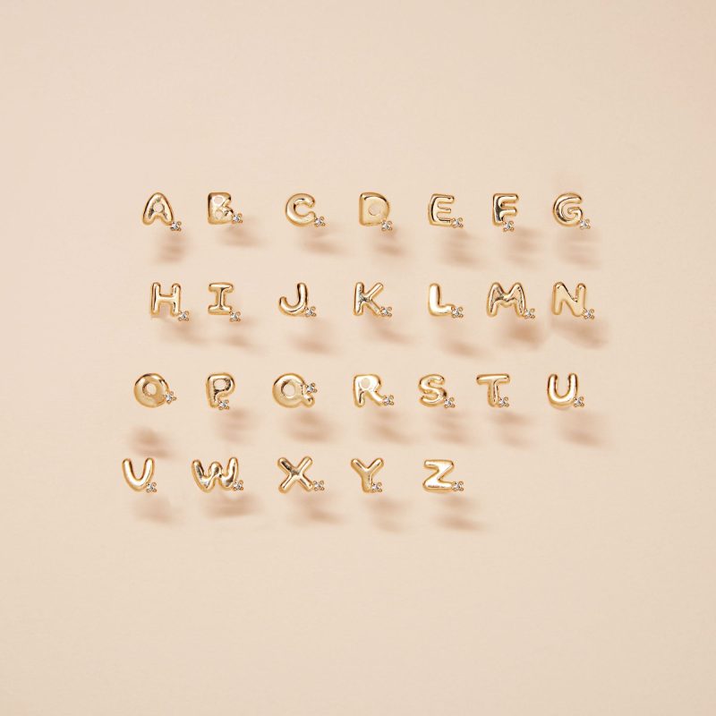 Stone and Strand 10K Yellow Gold Tiny Bubble Tea With Diamond Earring Editorial Initials Image