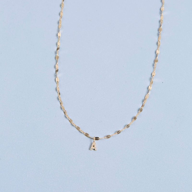 TINY DIAMOND INITIAL SPARKLE CHOKER STILL LIFE