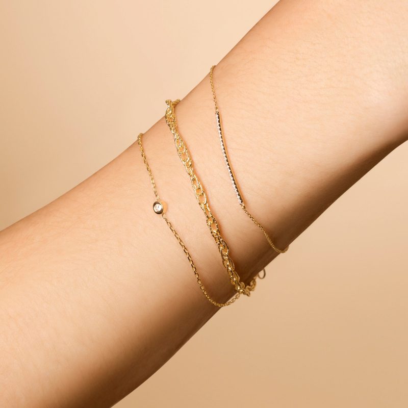 TINY ROUND DIAMOND BRACELET ON BODY