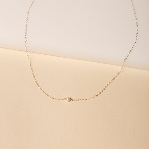 TINY SOLITAIRE PEARL NECKLACE EDITORIAL