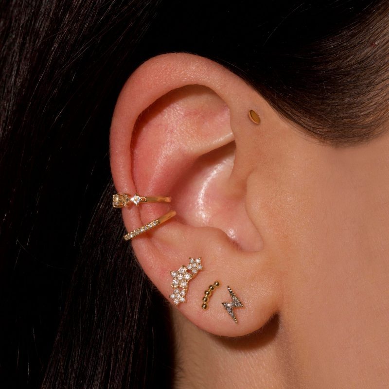 TRI STAR DIAMOND PIERCING EARRING ON BODY