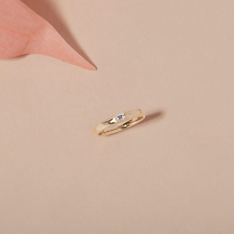 WHITE SAPPHIRE BAGUETTE PINKY RING EDITORIAL